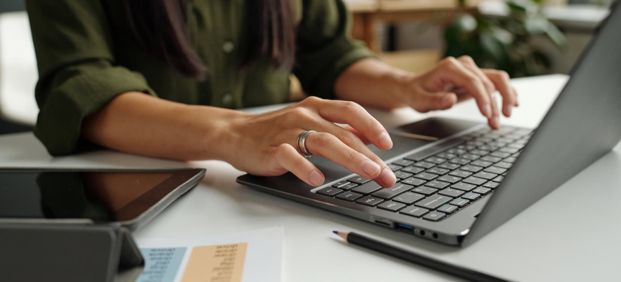 Close up of someone using laptop
